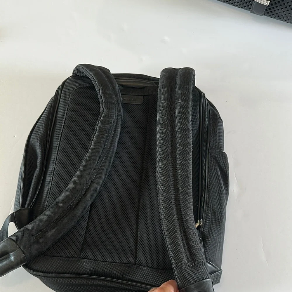 Tumi Black Backpack with Structured Design